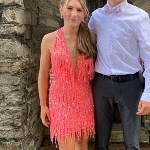 Size 0 Homecoming dress purchased at Kotsovos. No rips or tears. Smoke free home